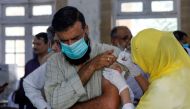FILE PHOTO: FILE PHOTO: A man receives a dose of a coronavirus disease (COVID-19) vaccine, at a vaccination center in Karachi, Pakistan April 28, 2021. REUTERS/Akhtar Soomro/File Photo
