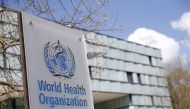 A logo is pictured outside a building of the World Health Organization (WHO) during an executive board meeting on update on the coronavirus disease (COVID-19) outbreak, in Geneva, Switzerland, April 6, 2021. REUTERS/Denis Balibouse/File Photo