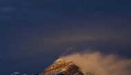 FILE PHOTO: Light illuminates Mount Everest, during sunset in Solukhumbu District also known as the Everest region, November 30, 2015. REUTERS/Navesh Chitrakar/File Photo