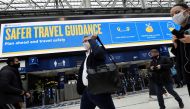People travel through Waterloo railway station during the morning rush hour as coronavirus disease (COVID-19) restrictions continue to ease throughout the country, London, Britain, May 19, 2021. REUTERS/Toby Melville