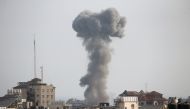 Smoke rises following an Israeli air strike, amid Israeli-Palestinian fighting, in Gaza, May 20, 2021. REUTERS/Ibraheem Abu Mustafa