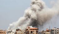 Smoke rises during an Israeli air strike, amid Israeli-Palestinian fighting, in Gaza City, May 20, 2021. Reuters/Ahmed Jadallah
