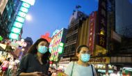 FILE PHOTO: People wearing face masks shop for street food in Chinatown amid the spread of the coronavirus disease (COVID-19) in Bangkok, Thailand, January 6, 2021. REUTERS/Athit Perawongmetha/File Photo
