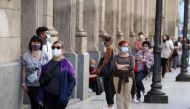File photo: People wearing face masks wait in line to be tested for the coronavirus disease (COVID-19) at the Colon Theatre, in Buenos Aires, Argentina April 13, 2021. REUTERS/Agustin Marcarian