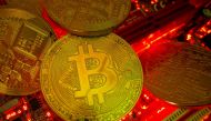 FILE PHOTO: Representations of the virtual currency Bitcoin stand on a motherboard in this picture illustration taken May 20, 2021. REUTERS/Dado Ruvic/Illustration