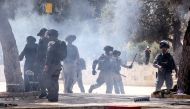 Israeli security forces clash with Palestinians at the compound that houses Al-Aqsa Mosque, in Jerusalem's Old City May 21, 2021. REUTERS/Ammar Awad
