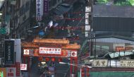 People are seen on an almost empty night market following the recent rise in the Coronavirus disease (COVID-19) infections in Taipei, Taiwan May 23, 2021. REUTERS/Ann Wang
