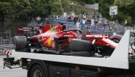 Formula One F1 - Monaco Grand Prix - Circuit de Monaco, Monte Carlo, Monaco - May 22, 2021 The car of Ferrari's Charles Leclerc is recovered after he crashed in qualifying Pool via REUTERS/Sebastien Nogier

