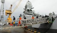 People who were stranded at sea aboard Barge P305 due to Cyclone Tauktae exit the Indian Naval Ship (INS) Kochi after they were rescued by the Indian Navy, at Naval Dockyard, Mumbai, India, May 19, 2021. REUTERS/Francis Mascarenhas