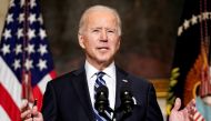 File photo: US President Joe Biden delivers remarks on tackling climate change prior to signing executive actions in the State Dining Room at the White House in Washington, U.S., January 27, 2021. REUTERS/Kevin Lamarque/File Photo