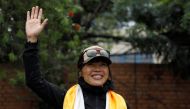 Hong Kong's Tsang Yin-Hung, 45, who scaled Mount Everest in less than 26 hours, the shortest time taken by any woman after starting from the base camp, waves for a picture upon her arrival after climbing Everest, in Kathmandu, Nepal May 30, 2021. Reuters/