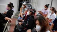 Medical workers wait to receive a dose of China's Sinopharm coronavirus disease (COVID-19) vaccine on a special vaccination day for health personnel in the municipality of Baruta in Caracas, Venezuela May 28, 2021. REUTERS/Leonardo Fernandez Viloria
