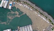 An aerial view shows a thick layer of 