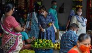 File photo: A woman wearing a protective face mask in a market, amidst the spread of the coronavirus disease (COVID-19) in Mumbai, India, August 20, 2020. Reuters/Hemanshi Kamani/File Photo