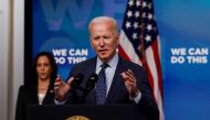 U.S. President Joe Biden delivers remarks on his administration's coronavirus disease (COVID-19) response, as Vice President Kamala Harris stands by in the Eisenhower Executive Office Building's South Court Auditorium at the White House in Washington, U.S