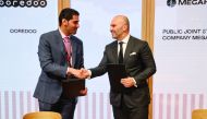 Ooredoo CEO Sheikh Mohammed bin Abdulla Al Thani and MegaFon CEO Gevork Vermishyan during agreement signing ceremony.
