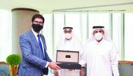 Hussain Al Fardan, QBA First Deputy to the Chairman, and Sheikh Dr. Khalid bin Thani Al Thani, QBA Second Deputy to the Chairman, presenting a souvenir to Ranil Jayawardena, UK Minister of State for International Trade and Parliamentary Undersecretary, in