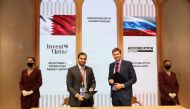 Sheikh Ali Alwaleed Al Thani (left), Chief Executive Officer at IPA Qatar, during the signing ceremony