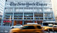 Vehicles drive past the New York Times headquarters in New York March 1, 2010. REUTERS/Lucas Jackson/File Photo