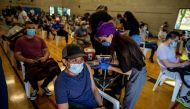 Humber River Hospital doctor Agarwal Seema administers a COVID-19 vaccine at a clinic planned for and organized by the Latino community, an ethno-racial group more at risk of hospitalization from coronavirus disease (COVID-19) according to city of Toronto