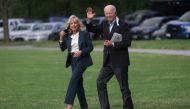 U.S. President Joe Biden and first lady Jill Biden walk to board Marine One for travel to the G7 Summit in the UK from the Ellipse at the White House in Washington, U.S., June 9, 2021. REUTERS/Leah Millis
