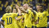 Sweden's Marcus Danielson celebrates scoring a goal with teammates (Reuters/Janerik Henriksson/tt)