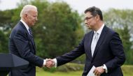 U.S. President Joe Biden shakes hands with Pfizer CEO, Albert Bourla, after speaking about his administration's pledge to donate 500 million doses of the Pfizer (PFE.N) coronavirus vaccine to the world's poorest countries, during a visit to St. Ives in Co