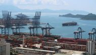 FILE PHOTO: FILE PHOTO: A cargo ship carrying containers is seen near the Yantian port in Shenzhen, following the novel coronavirus disease (COVID-19) outbreak, Guangdong province, China May 17, 2020. REUTERS/Martin Pollard/File Photo/File Photo
