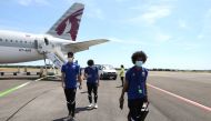 Qatar striker Akram Afif (foreground) along with team-mates at the airport as national team reaches Croatia for a training camp.