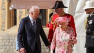 Britain's Queen Elizabeth walks with U.S. President Joe Biden and first lady Jill Biden as they meet at Windsor Castle, in Windsor, Britain, June 13, 2021. Chris Jackson/Pool via REUTERS
