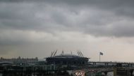 FILE PHOTO: Vehicles drive along a motorway near the Gazprom Arena soccer stadium, one of the host venues for the Euro 2020 tournament, in Saint Petersburg, Russia May 20, 2021. REUTERS/Anton Vaganov/FILE PHOTO