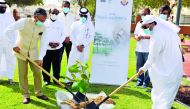 Ambassador of India to Qatar, Dr. Deepak Mittal, and Assistant Director of Public Parks Department, Mohammed Ibrahim Al Saada, during a tree-planting event at Al Mamoura Park.