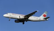 FILE PHOTO: An Air Canada Airbus A320-200 airplane prepares to land at Vancouver's international airport in Richmond, British Columbia, Canada, February 5, 2019. REUTERS/Ben Nelms/File Photo
