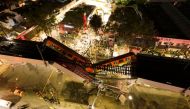 A general view of damage caused after a railway overpass and train collapsed onto a busy road in this drone picture obtained from social media Mexico City, Mexico May 4, 2021. Picture taken with a drone. INSTAGRAM @CSDRONES/via REUTERS