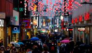 Shoppers walk down Hohe Strasse shopping district one day before Germany goes back to a complete lockdown due to the coronavirus disease (COVID-19) outbreak, in Cologne, Germany, December 15, 2020. REUTERS/Thilo Schmuelgen