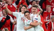 Soccer Football - Euro 2020 - Group B - Russia v Denmark - Parken Stadium, Copenhagen, Denmark - June 21, 2021 Denmark's Joakim Maehle celebrates scoring their fourth goal with Thomas Delaney and Christian Norgaard Pool via REUTERS/Wolfgang Rattay
