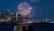 People watch fireworks in the New York City Harbor, as New York State celebrates reaching a 70 percent vaccination threshold for the coronavirus disease (COVID-19), as seen from Jersey City, New Jersey, U.S., June 15, 2021. REUTERS/Eduardo Munoz

