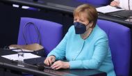 German Chancellor Angela Merkel sits after she delivered a government declaration on the upcoming European Council meeting at the lower house of parliament Bundestag in Berlin, Germany, June 24, 2021. (Reuters/Christian Mang)