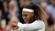 June 29, 2021 Serena Williams of the U.S. reacts after sustaining an injury before retiring from her first round match against Belarus' Aliaksandra Sasnovich Pool via REUTERS/Jed Leicester