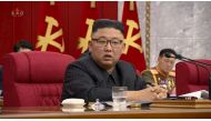 North Korean Leader Kim Jong Un speaks at plenary meeting of 8th central committee of the Workers' Party of Korea in this still image taken from KRT footage on June 16, 2021. 