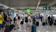 Tourists from Britain arrive at Palma de Mallorca Airport following London's lifted quaraintine requirements for travellers returning from the Balearic Islands, amid the coronavirus disease (COVID-19) pandemic, in Palma de Mallorca, Spain June 30, 2021. R