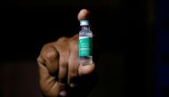 A man displays a vial AstraZeneca's COVISHIELD vaccine as the country receives its first batch of coronavirus disease (COVID-19) vaccines under COVAX scheme, in Accra, Ghana February 24, 2021. REUTERS/Francis Kokoroko/File Photo/File Photo