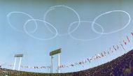 Japanese air force's aerobatic team Blue Impulse draws Olympic rings in the sky at the opening ceremony of the 1964 Tokyo Olympic Games, over the captial in Japan in this photo taken by Kyodo October 10, 1964. Picture taken October 10, 1964. Kyodo via REU