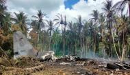 View of the site after a Philippines Air Force Lockheed C-130 plane carrying troops crashed on landing in Patikul, Sulu province, Philippines July 4, 2021. Armed Forces of the Philippines - Joint Task Force Sulu