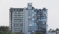 FILE PHOTO: View of the partially collapsed residential building as rescue operations are stopped, in Surfside, Florida, U.S., July 4, 2021. REUTERS/Marco Bello