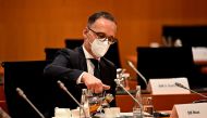 FILE PHOTO: German Foreign Minister Heiko Maas prepares for the weekly cabinet meeting in Berlin, Germany June 30, 2021. Tobias Schwarz/Pool via REUTERS/File Photo

