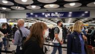 Arriving passengers queue at UK Border Control at the Terminal 5 at Heathrow Airport in London, Britain June 29, 2021. REUTERS/Hannah Mckay/File Photo
