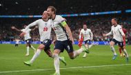 Soccer Football - Euro 2020 - Semi Final - England v Denmark - Wembley Stadium, London, Britain - July 7, 2021 England's Harry Kane celebrates scores their second goal with teammate Phil Foden Pool via REUTERS/Laurence Griffiths
