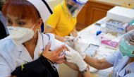 A health worker receives the Sinovac coronavirus disease (COVID-19) vaccine at the Samut Sakhon hospital in Samut Sakhon province, Thailand, February 28, 2021. REUTERS/Athit Perawongmetha/File Photo