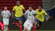 Soccer Football - Copa America 2021 - Semi Final - Argentina v Colombia - Estadio Mane Garrincha, Brasilia, Brazil - July 6, 2021 Argentina's Lionel Messi in action with Colombia's Juan Cuadrado REUTERS/Henry Romero
